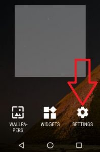 Tap & hold the blank screen area of phone